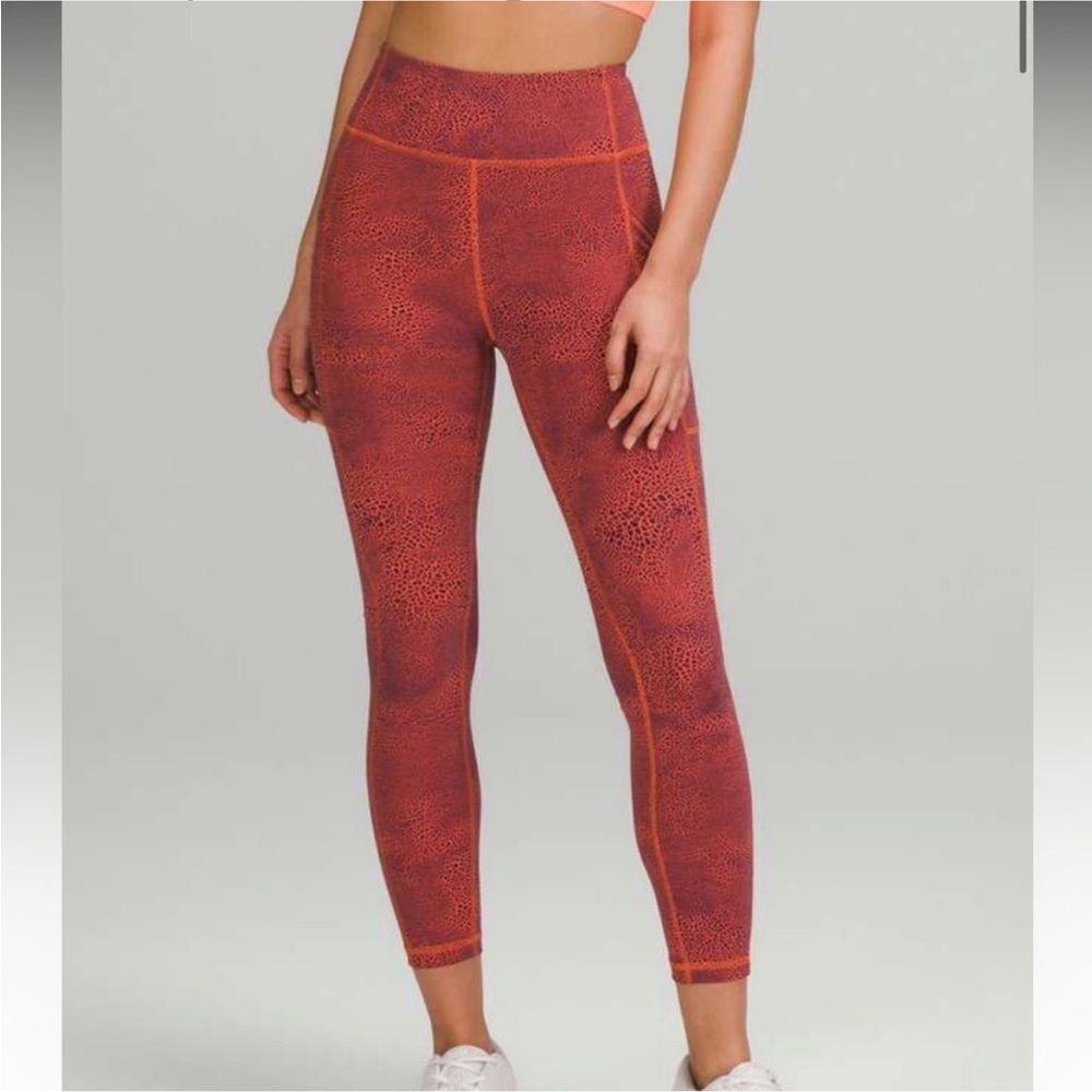 Lululemon Invigorate High-Rise Tight 25"
Crackle Glaze Vintage Orange Larkspur